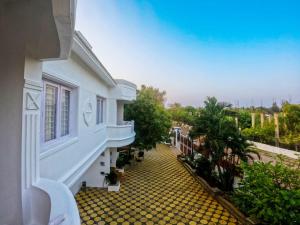 Imagine din galeria proprietății Hotel auroville grand în Covelong +33 fotografii