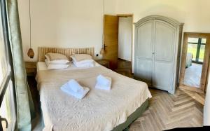 Ένα ή περισσότερα κρεβάτια σε δωμάτιο στο Casa Campo