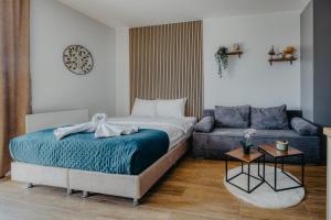 Postel nebo postele na pokoji v ubytování SKY VIEW Apartment - Ski resort Kopaonik