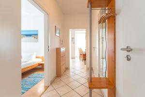 Ένα ή περισσότερα κρεβάτια σε δωμάτιο στο Haus Südwind, App 18 +15 φωτογραφίες