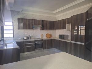 Kuchyň nebo kuchyňský kout v ubytování Makupula Apartments