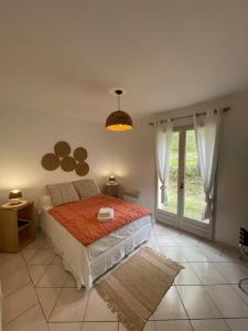 a bedroom with a bed and a large window at Villa Lola in Bargemon +53 photos