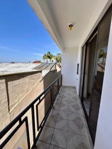 a balcony with a view of the ocean at Apê Brisa do Mar in Pontal do Paraná