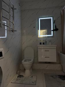 Koupelna v ubytování Теремки