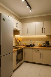 Kuchyň nebo kuchyňský kout v ubytování Теремки