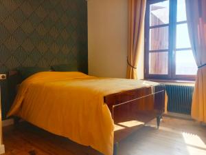 Postel nebo postele na pokoji v ubytování La petite Maison