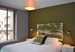 Postel nebo postele na pokoji v ubytování Dreamhouse Apartments Glasgow City Centre