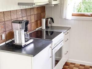 Køkken eller tekøkken på 6 person holiday home in Idestrup-By Traum