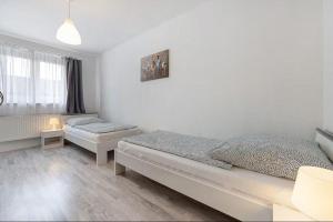 a bedroom with two beds in a room at Ferienhaus-Heide in Bad Fallingbostel