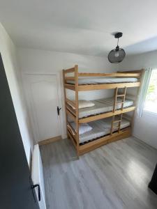 a room with bunk beds in a room at Cocon privé avec vue montagne exceptionnelle in Verrens-Arvey
