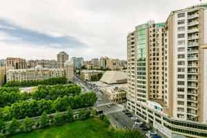 an aerial view of a city with tall buildings at Bakı Rezidens Apartment Nizami str in Baku