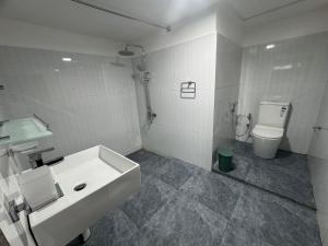 Ένα μπάνιο στο Coco Nook Villa