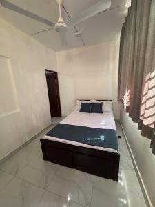 Ένα ή περισσότερα κρεβάτια σε δωμάτιο στο Coco Nook Villa