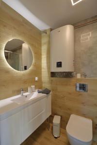 Ένα μπάνιο στο Apartamenty Eltegro FV