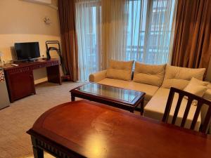 TV a/nebo společenská místnost v ubytování Downtown Bansko Resort