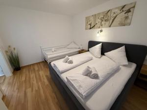 Ένα ή περισσότερα κρεβάτια σε δωμάτιο στο Kern Apartments +99 φωτογραφίες