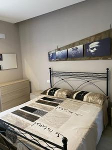 Ένα ή περισσότερα κρεβάτια σε δωμάτιο στο Casa Emma