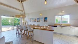 Kuchyň nebo kuchyňský kout v ubytování Host Villas LOUMÉA Saubion