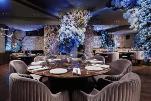 a dining room with a table and chairs at Gatsby Athens in Athens