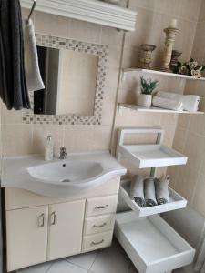 Et badeværelse på Strand and Sea Cottage