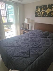 Postel nebo postele na pokoji v ubytování Christian Apartament