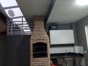 Kuchyň nebo kuchyňský kout v ubytování Casa a 500m da praia