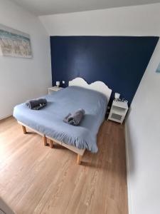 En eller flere senge i et værelse på Maison Domaine du Golf de Pierre et Vacances