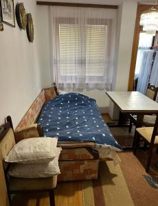 Postel nebo postele na pokoji v ubytování Royal Travnik