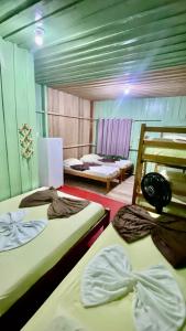 Postel nebo postele na pokoji v ubytování Luz Amazônia Lodge