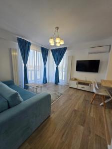 TV a/nebo společenská místnost v ubytování Lovely Apartment