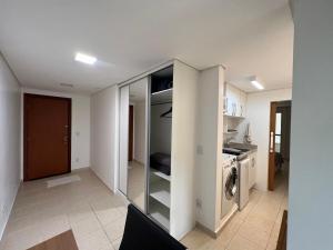 Η κουζίνα ή μικρή κουζίνα στο Espaço e conforto na Asa Norte +4 φωτογραφίες