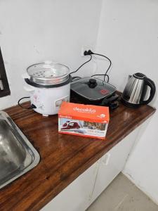 Kuchyň nebo kuchyňský kout v ubytování Star Box Dream Vacation