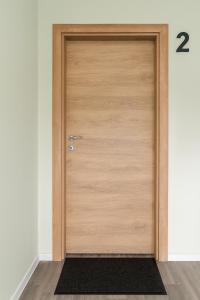 a wooden door with the number on it at Apollo Home - Zuhause in der Natur! in Wildflecken