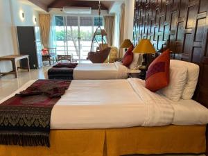 Postel nebo postele na pokoji v ubytování Rainbow Arokaya Holistic Longevity Wellness Resort - Riverfront Room 6 + 145 fotografií