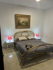 Giường trong phòng chung tại Oasis Blue