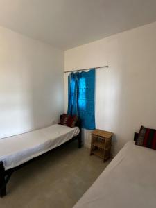 Giường trong phòng chung tại Oasis Blue +19 ảnh