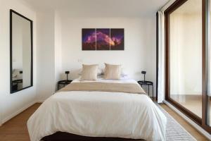 Postel nebo postele na pokoji v ubytování Refugio Bellavista vista al Costanera y los Andes + 49 fotografií