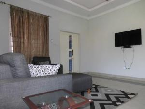 Et tv og/eller underholdning på Kfam Luxury Apartments + 3 billeder