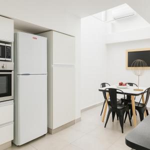 Køkken eller tekøkken på Atenea Residence