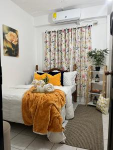 Ένα ή περισσότερα κρεβάτια σε δωμάτιο στο Cozy Comfy Budget Friendly +17 φωτογραφίες