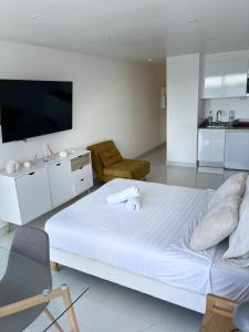 Kuchyň nebo kuchyňský kout v ubytování Les studio Ciels et Terre