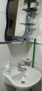 Koupelna v ubytování Monoambiente amoblado + 5 fotografií