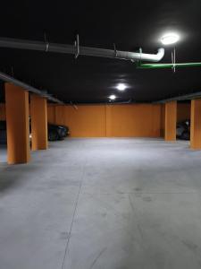 an empty parking garage with cars parked in it at Martil , Lieu tranquille avec piscine in Martil