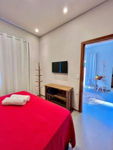 Et tv og/eller underholdning på Residencial Papagaios + 178 billeder