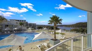 a view of the pool at a resort at Seachange Studio Ettalong Beach Resort in Ettalong Beach