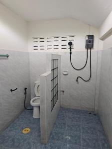 a bathroom with a toilet and a shower stall at Friends Retreat Phuket in Ban Bo Han +43 photos
