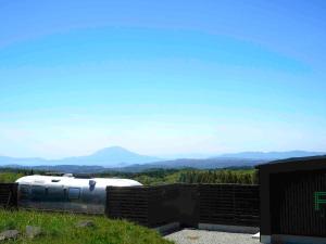 a view of the mountains from a house at FOG villa&spa in Kirishima +50 photos