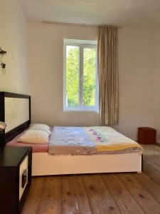 Postel nebo postele na pokoji v ubytování Backpackers Hostel Homestay + 3 fotografie