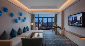 TV a/nebo společenská místnost v ubytování Onejee Hotel Shenzhen