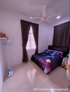 Ένα ή περισσότερα κρεβάτια σε δωμάτιο στο Home2u Alor Setar Homestay